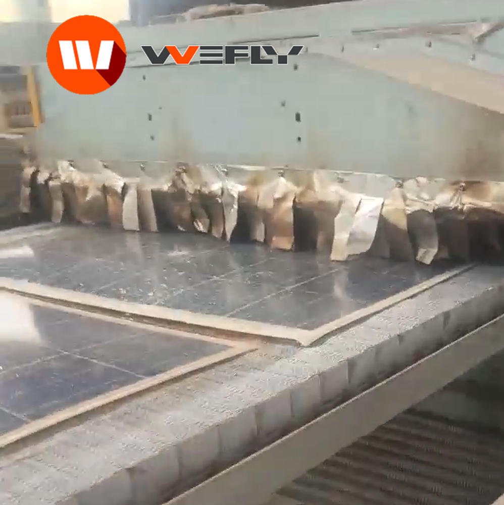 Waste solar panel recycling machine, industrial pyrolysis equipment for single-glass and double-glass PV modules inside factory workshop.