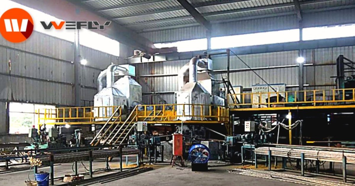 WOLFU brass rod horizontal continuous casting machine running in a factory workshop, with melting furnace and safety railings.